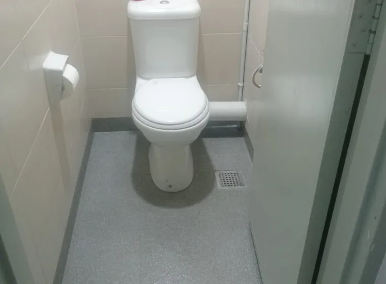 Solid grey anti-slip epoxy bathroom floor